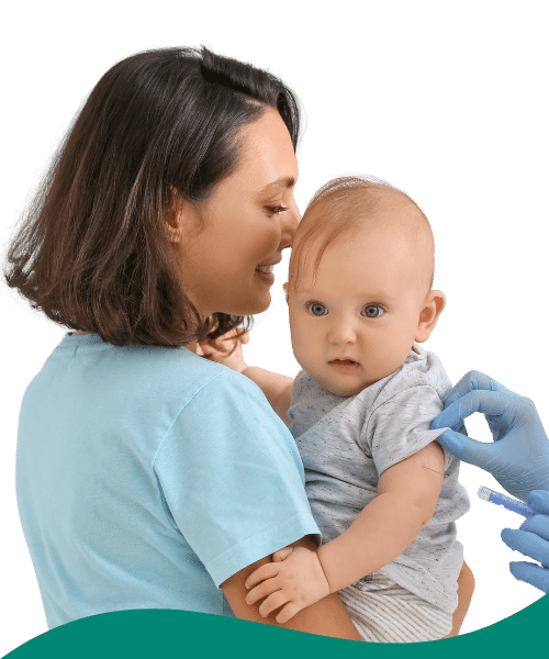 Mother holding her baby who is getting immunized