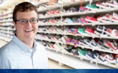 Image of Lakeview Podiatrist, Dr. David Arens, in a shoe store.